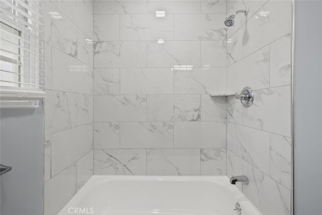 full bath featuring shower / bathtub combination