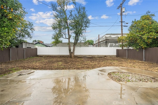 view of patio with a fenced backyard