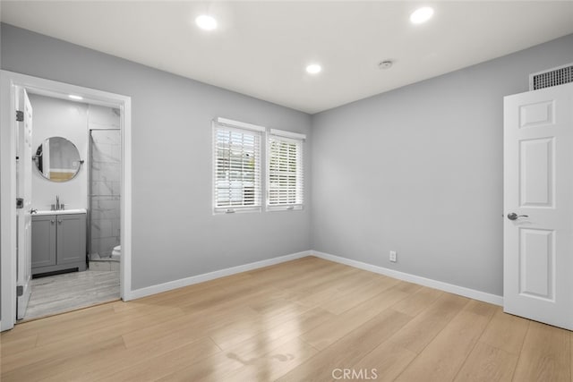 unfurnished bedroom featuring recessed lighting, baseboards, visible vents, and light wood finished floors