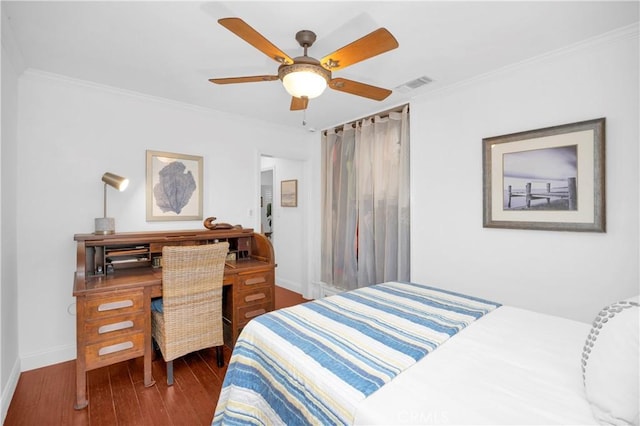 bedroom with visible vents, ornamental molding, a ceiling fan, dark wood finished floors, and baseboards