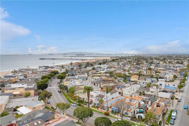 birds eye view of property featuring a residential view and a water view