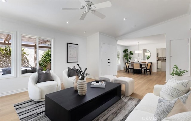 22902 Via Cruz, Laguna Niguel, CA 92677 - living area featuring ornamental molding, light wood-style floors, lofted ceiling, ceiling fan, and recessed lighting