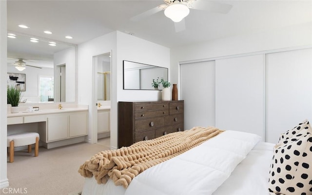 22902 Via Cruz, Laguna Niguel, CA 92677 - bedroom with a closet, light colored carpet, ensuite bathroom, recessed lighting, and ceiling fan