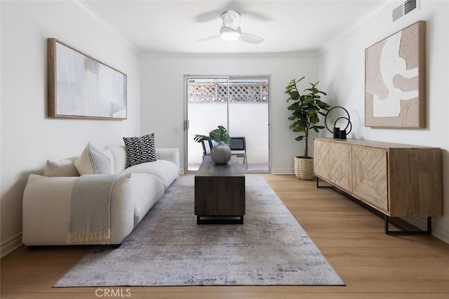 22902 Via Cruz, Laguna Niguel, CA 92677 - living area featuring ceiling fan, crown molding, wood finished floors, and baseboards