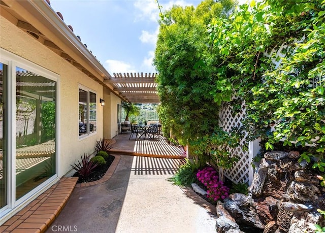 22902 Via Cruz, Laguna Niguel, CA 92677 - view of patio featuring outdoor dining space and a pergola