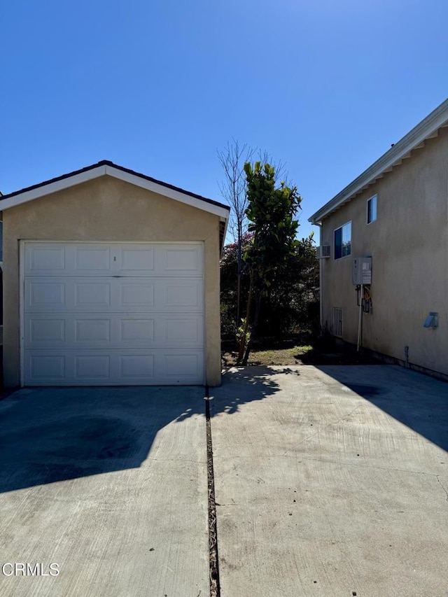 garage featuring driveway