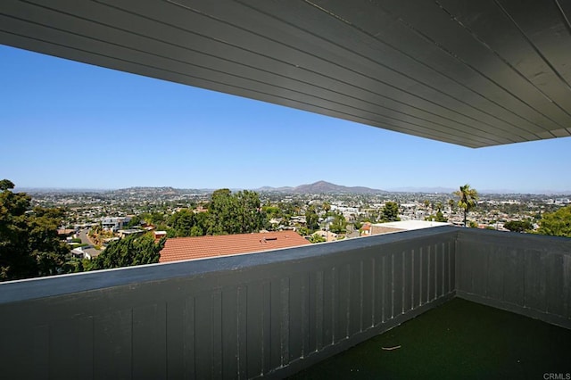 balcony featuring a mountain view