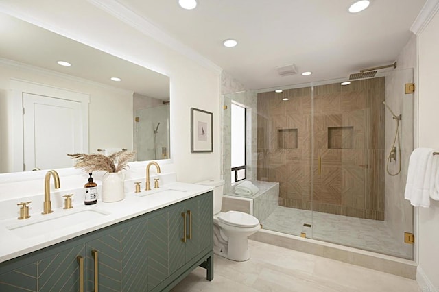 bathroom featuring double vanity, a stall shower, crown molding, and a sink