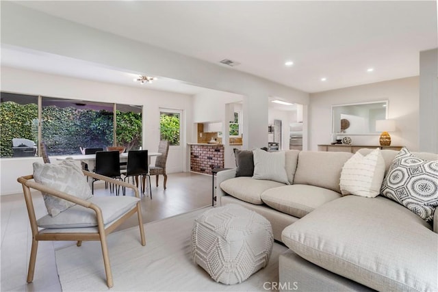 living area featuring recessed lighting and light wood-type flooring