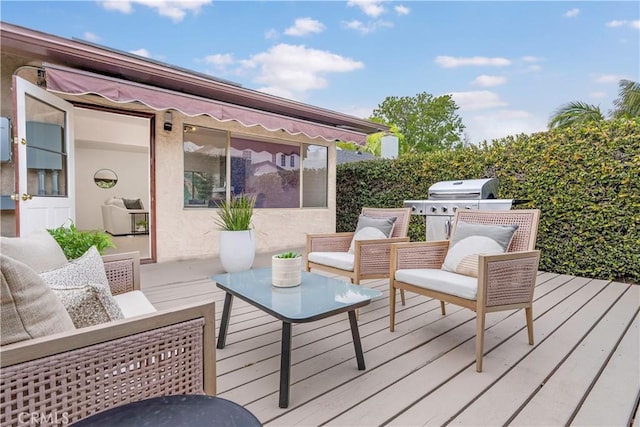 wooden deck featuring outdoor lounge area