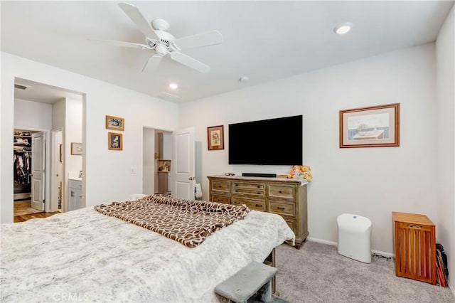 bedroom with recessed lighting, light colored carpet, baseboards, and ceiling fan