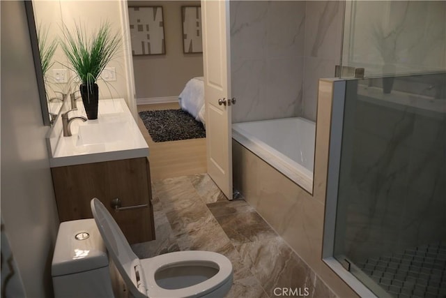 full bathroom with vanity, a garden tub, toilet, and a shower with shower door