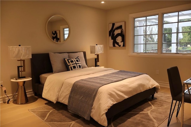 bedroom featuring recessed lighting, baseboards, and wood finished floors