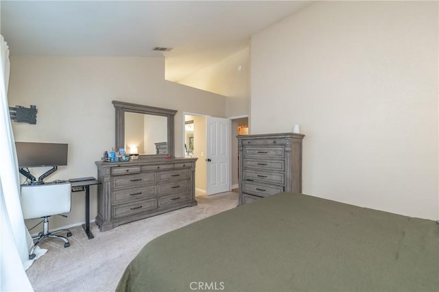 bedroom with vaulted ceiling, baseboards, visible vents, and light carpet