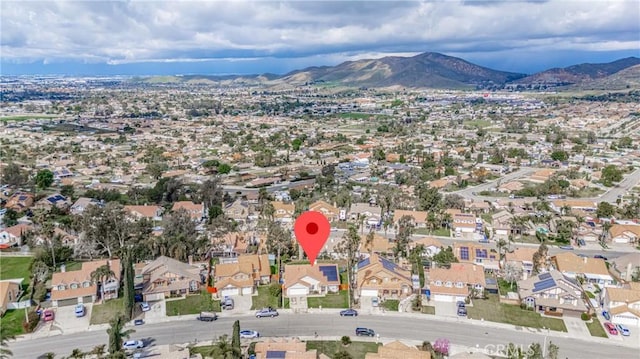 birds eye view of property featuring a residential view and a mountain view