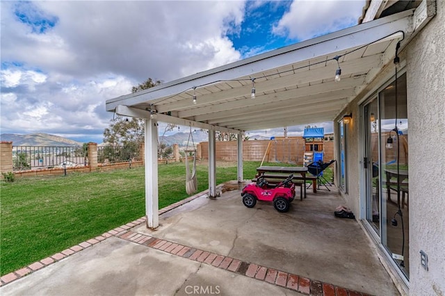 view of patio with a fenced backyard