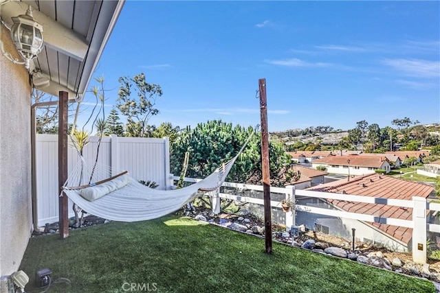 view of yard featuring fence