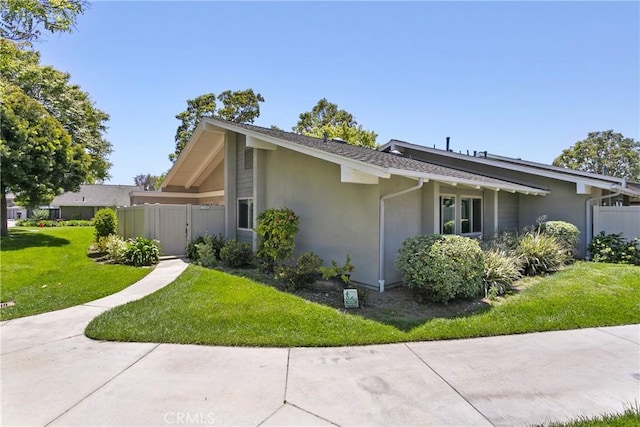 8933 Amador Cir Unit 1316E, Huntington Beach, CA 92646 - view of side of home featuring stucco siding