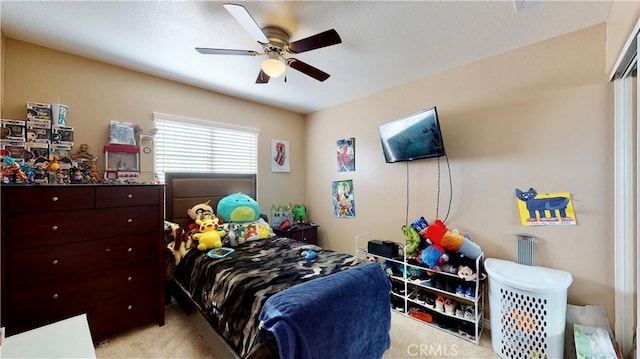 8846 Tamarisk Ave, Hesperia, CA 92344 - carpeted bedroom featuring a ceiling fan