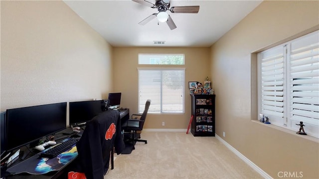 8846 Tamarisk Ave, Hesperia, CA 92344 - carpeted home office with a ceiling fan and baseboards