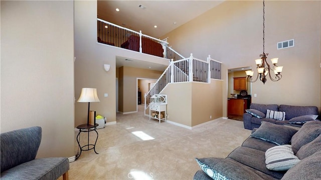 8846 Tamarisk Ave, Hesperia, CA 92344 - living area featuring light colored carpet, a chandelier, a towering ceiling, and baseboards