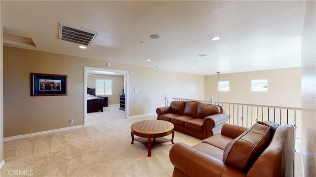 8846 Tamarisk Ave, Hesperia, CA 92344 - living area with light carpet, baseboards, and recessed lighting