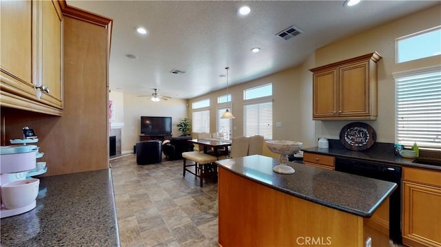 8846 Tamarisk Ave, Hesperia, CA 92344 - kitchen with a kitchen island, ceiling fan, a fireplace, open floor plan, and black dishwasher
