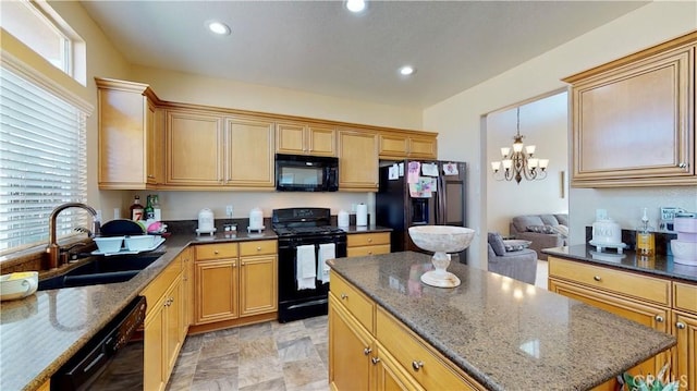 8846 Tamarisk Ave, Hesperia, CA 92344 - kitchen featuring black appliances, a sink, dark stone counters, recessed lighting, and a chandelier