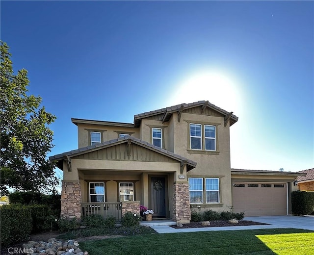 craftsman-style house with covered porch, stucco siding, a garage, stone siding, and driveway