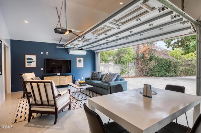 view of patio featuring outdoor lounge area, an AC wall unit, outdoor dining area, and fence