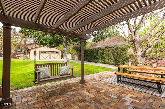 view of patio featuring an outbuilding and a pergola