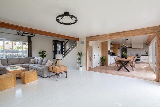 236 Avenida Montalvo, San Clemente, CA 92672 - living area featuring light wood-style floors, plenty of natural light, and stairs