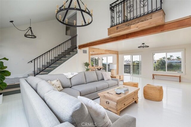 236 Avenida Montalvo, San Clemente, CA 92672 - living area with a towering ceiling, stairway, and a chandelier
