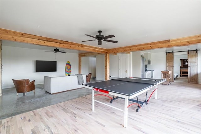 236 Avenida Montalvo, San Clemente, CA 92672 - rec room featuring a barn door, a ceiling fan, and light wood-style floors