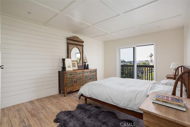 236 Avenida Montalvo, San Clemente, CA 92672 - bedroom with wood-type flooring, access to outside, wooden walls, and coffered ceiling
