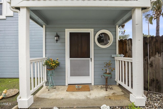 property entrance with fence