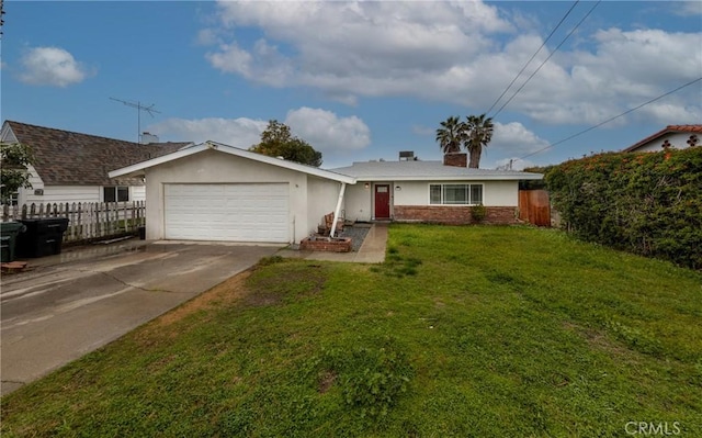 single story home featuring a garage, concrete driveway, a front yard, and fence