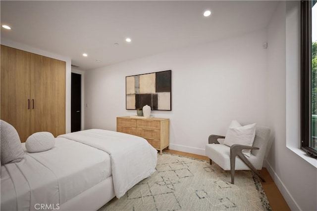 5244 Tampa Ave, Tarzana, CA 91356 - bedroom featuring light wood finished floors, recessed lighting, and baseboards