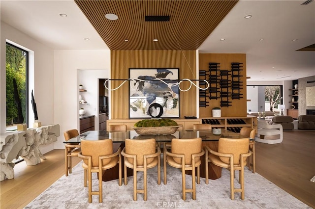 5244 Tampa Ave, Tarzana, CA 91356 - dining room with recessed lighting, wood finished floors, and a healthy amount of sunlight