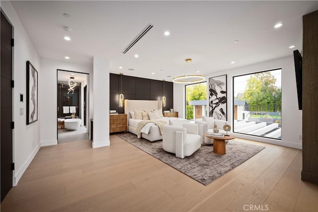 5244 Tampa Ave, Tarzana, CA 91356 - bedroom featuring visible vents, light wood finished floors, baseboards, recessed lighting, and access to outside