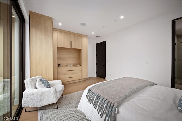 5244 Tampa Ave, Tarzana, CA 91356 - bedroom featuring visible vents, recessed lighting, and light wood-style floors