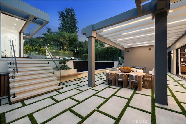 5244 Tampa Ave, Tarzana, CA 91356 - view of patio featuring outdoor dining space and a pergola