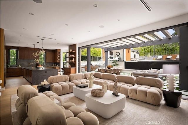 5244 Tampa Ave, Tarzana, CA 91356 - living area featuring recessed lighting and light wood-style floors