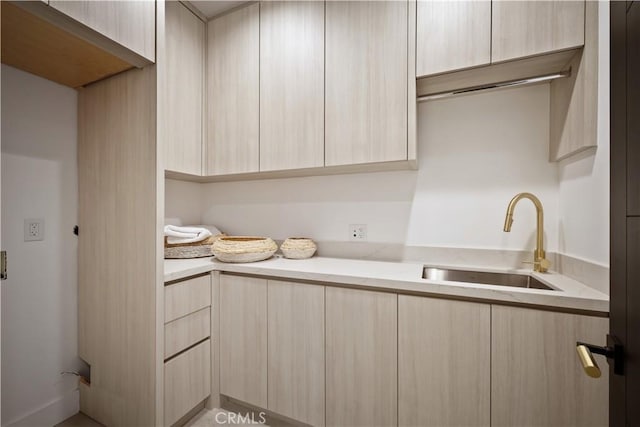 5244 Tampa Ave, Tarzana, CA 91356 - kitchen featuring light brown cabinets, modern cabinets, and a sink