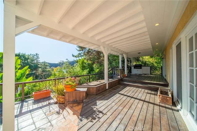 wooden terrace with grilling area