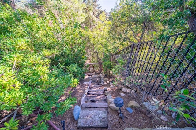 view of yard with fence