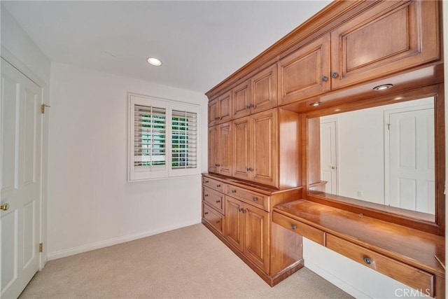 home office with recessed lighting, baseboards, and light carpet