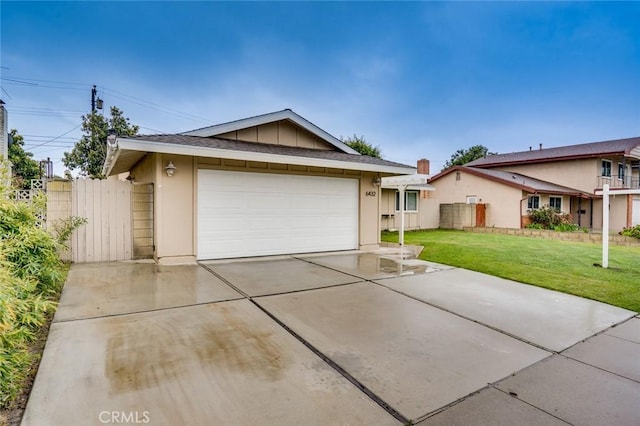6432 Weber Cir, Huntington Beach, CA 92647 - ranch-style home with concrete driveway, fence, a front yard, and an attached garage