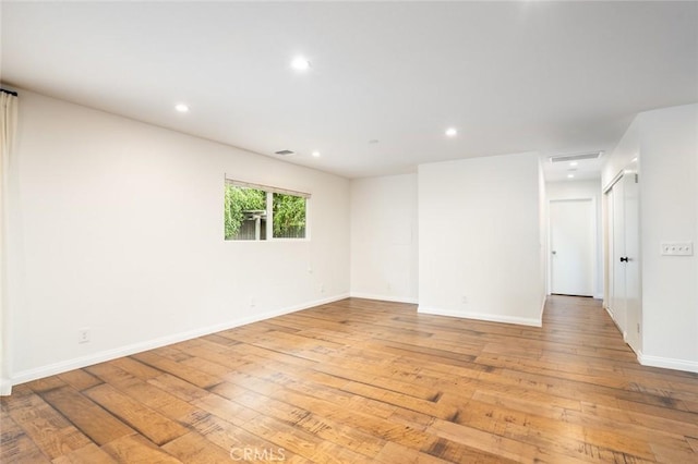 6432 Weber Cir, Huntington Beach, CA 92647 - unfurnished room featuring visible vents, light wood-style flooring, baseboards, and recessed lighting