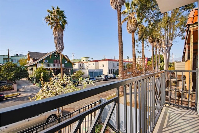 balcony featuring a residential view